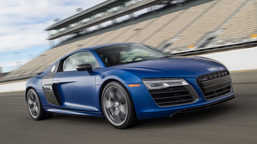 2014-audi-r8-v10-plus-three-quarters-in-motion-front-view-005.jpg